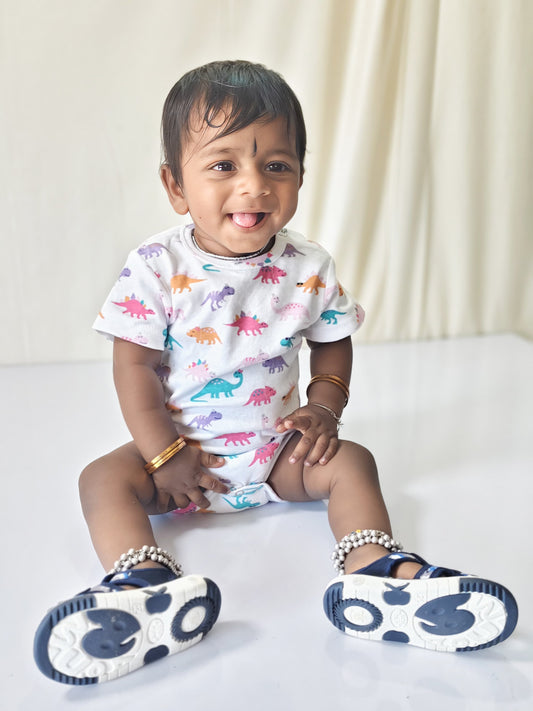 Multicolor dino onesies